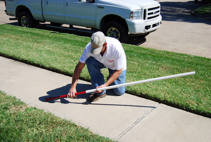 Electrical conduit and water pipe installation under sidewalks