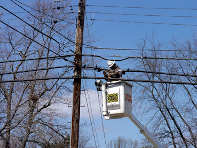 Telco Worker Rig On Wires