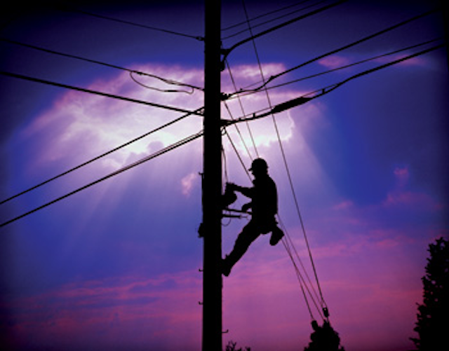 Telco Worker On Pole Sun1