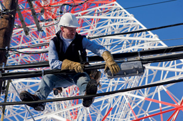 Telco Worker On Tower