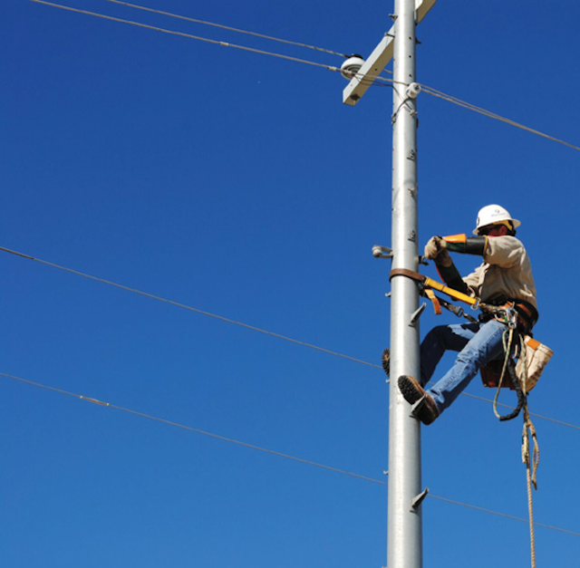 Climbing A Galvanized Steel Pole With Proper Fall Protection 2