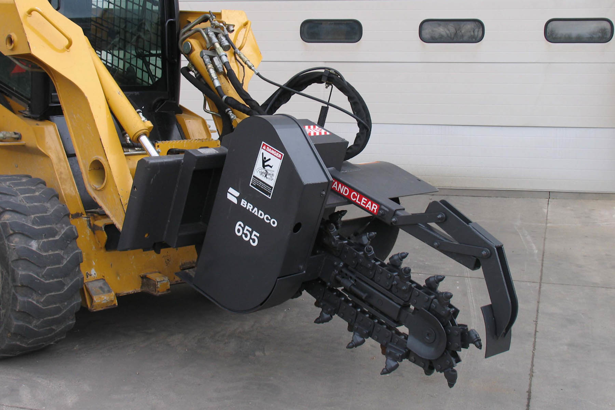 Rock Trencher Attachment Mounts to Highflow Skid Steer Loaders for