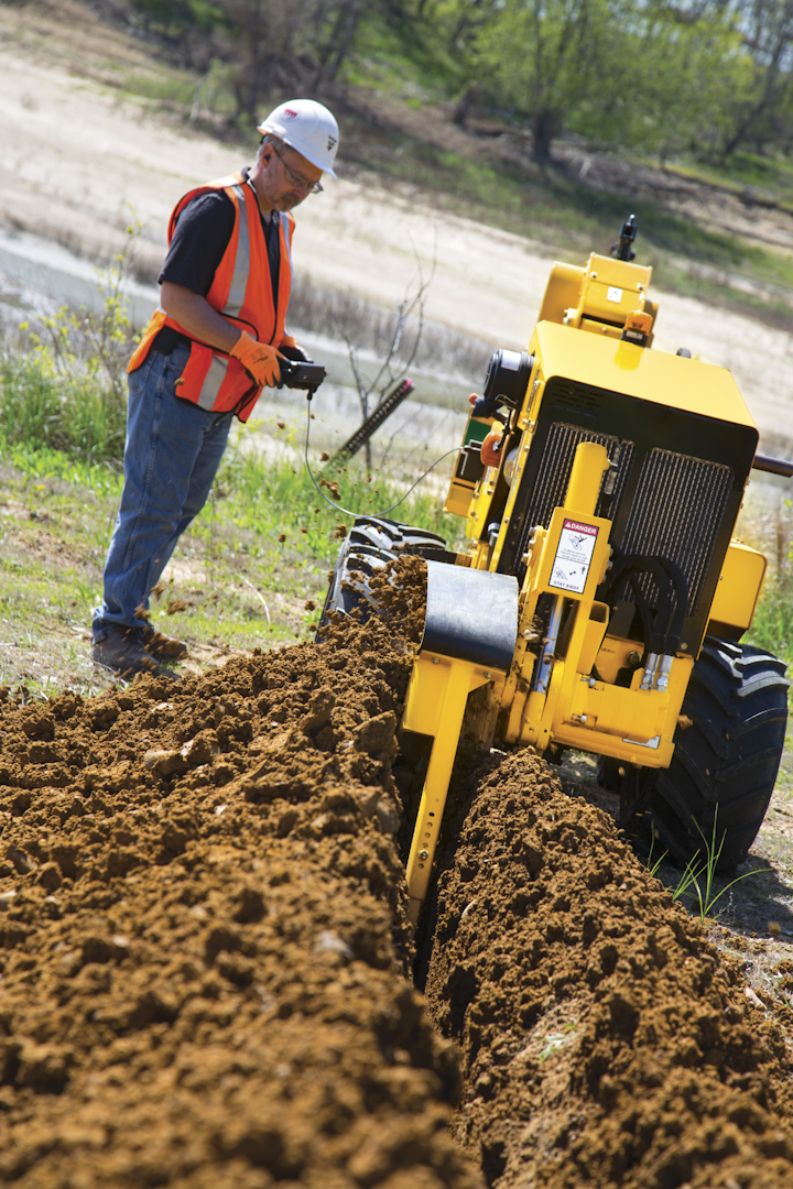 Content Dam Up En Articles 2015 07 Construction Equipment Walk Beside Service Plow With Trencher Leftcolumn Article Thumbnailimage File